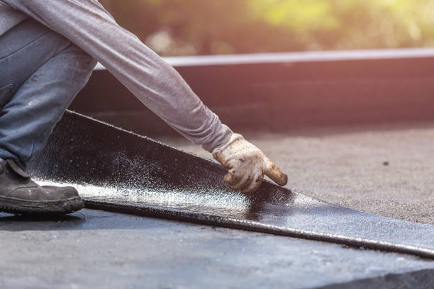 Professional Basement Waterproofing technician working in Blue Rock, OH